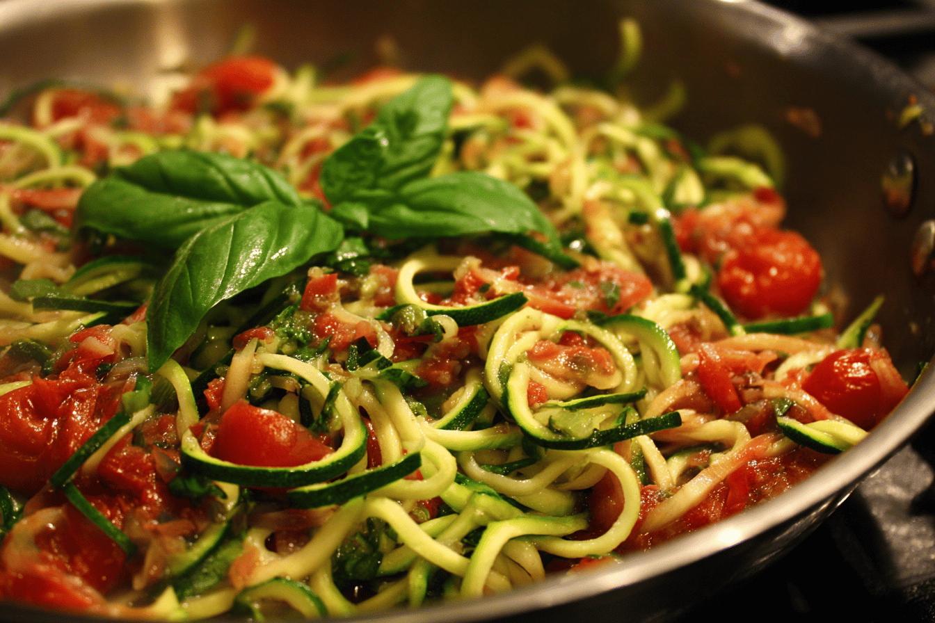 Raw Spiralized Zucchini Noodles with Tomatoes and Pesto